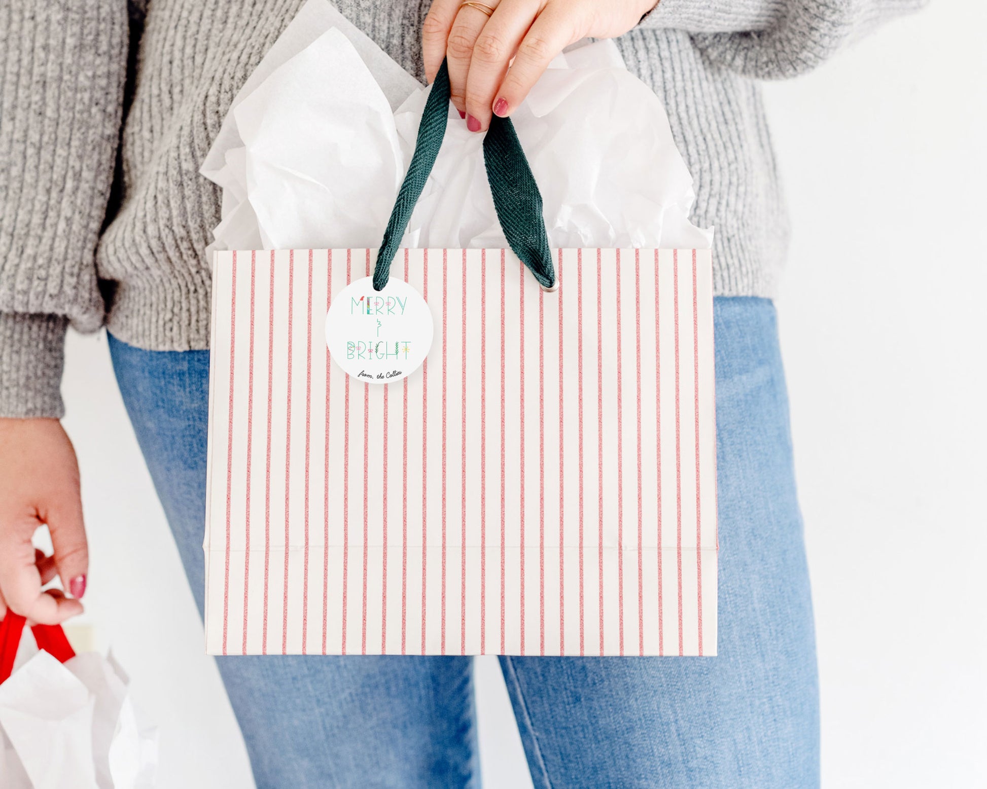 merry and bright personalized holiday circle gift tags, round christmas hang tags, meredith collie paper, attached to gift bag for scale