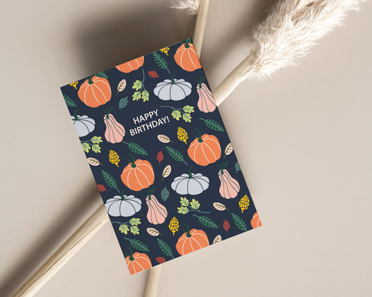 Mini fall birthday card with pastel pumpkin design, cozy autumn colors, and matching envelope.