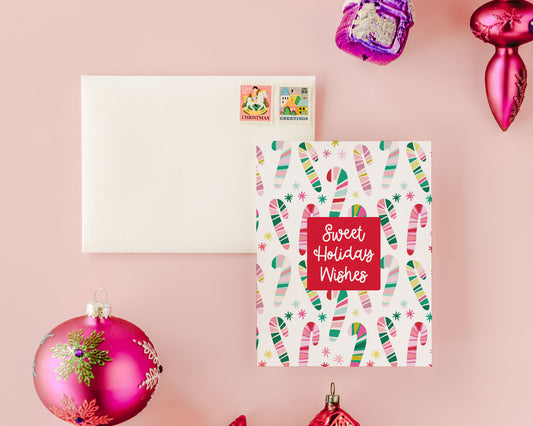 Colorful Striped Candy Canes Christmas Greeting Card