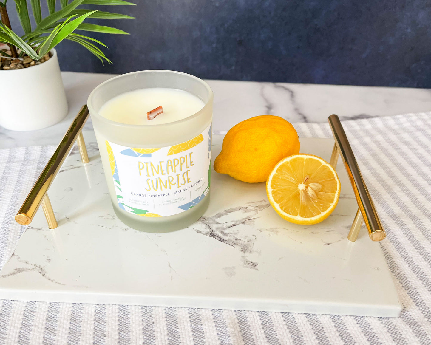 pineapple sunrise candle, orange pineapple mango coconut scent, frosted glass vessel, wood wick, meredith collie paper